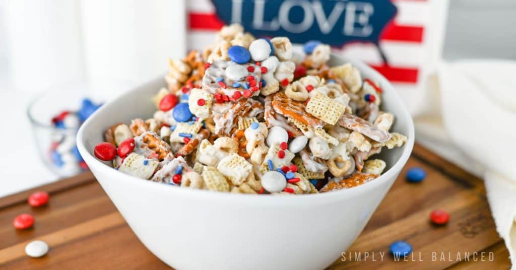 Patriotic Snack Mix - pretzels, cereal, melted chocolate and red white and blue m&ms.